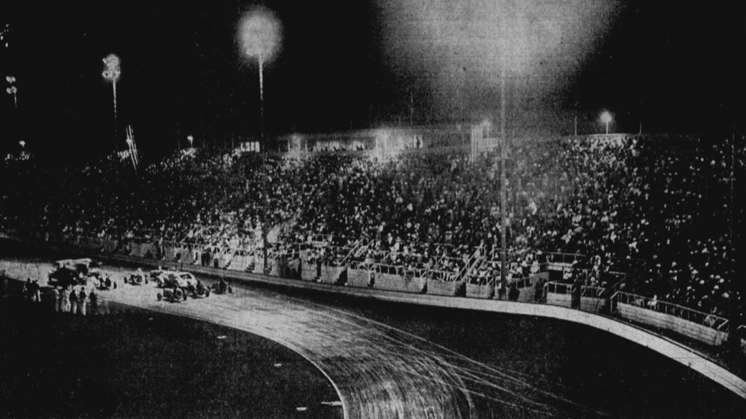 Midget race under the lights at a packed Gilmore Stadium, 1941
